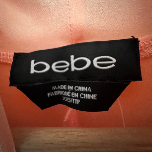 Bebe XXS NWT Pink Mulberry Silk Blend Bodysuit Top Sleeveless Deep V Neck - Picture 6 of 9